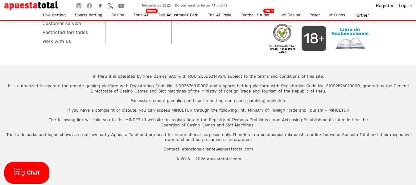 Screenshot of Apuesta Total's footer licence and regulator details