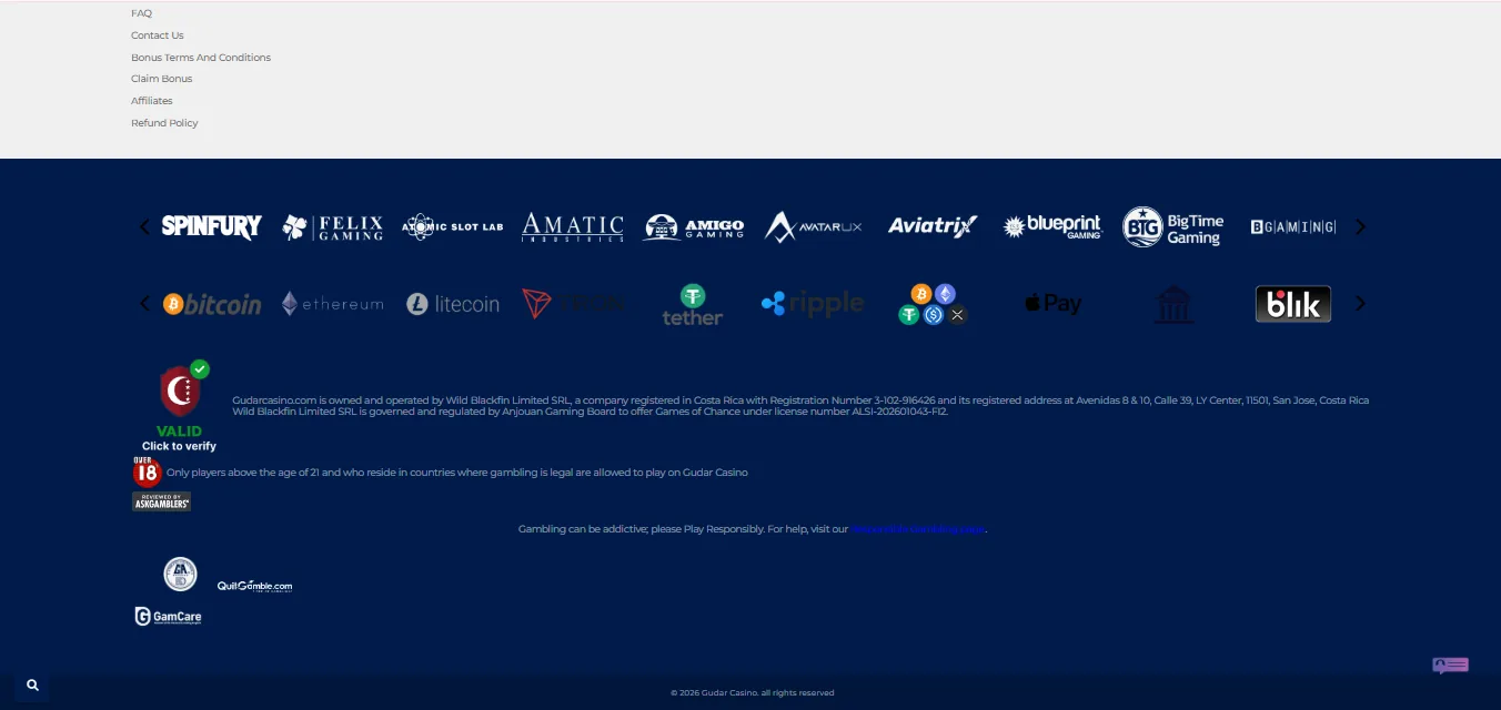 Screenshot of Gudar Casino's footer licence and regulator details